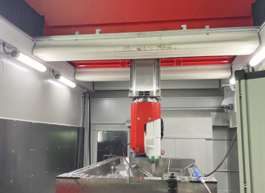Five axis machining center